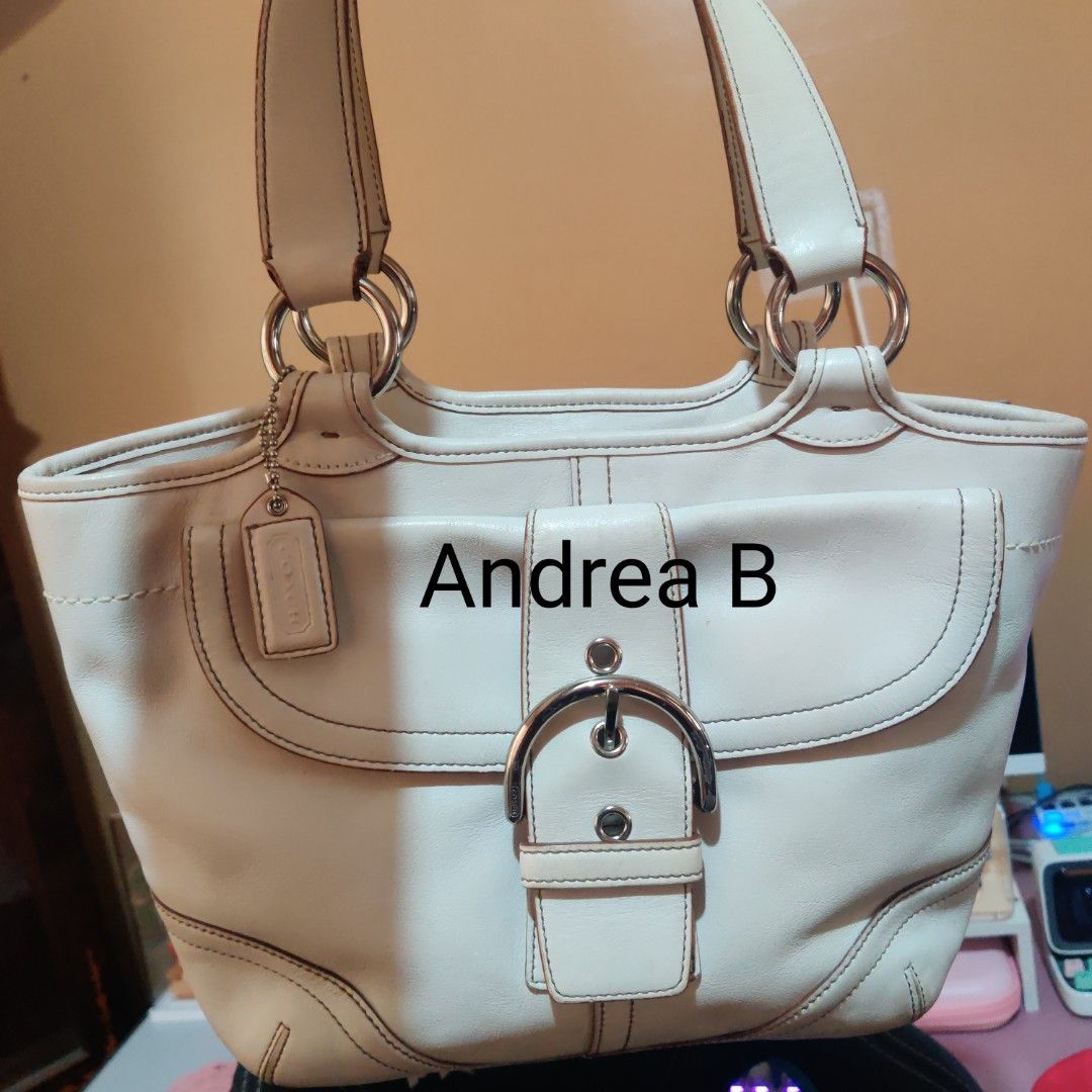 Coach Soho Buckle Leather Tote - Black & White (Category: Luxury Bags & Wallets) located in Davao. Submitted by deahs (Listing ID 1376335672, Image 3). Description: BUNDLE PRICE - 3.5k (LP) COACH Soho Buckle Leather Tote Bag in Black Flaws: Hardware tarnish, rubber lining, no hang tag Individual price: 1800 COACH Soho Buckle Leather Tote Bag in White Flaws: Hardware tarnish, Minimal stains, rubber lining Individual price: 1800 Dimensions: 7 inche
