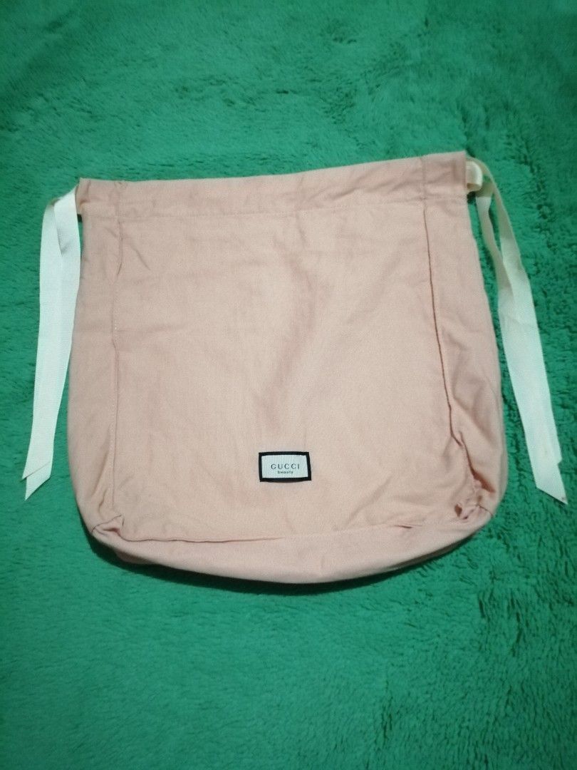GUCCI DRAWSTRING BEAUTY POUCH (Category: Luxury Bags & Wallets) located in Iligan City. Submitted by RL_Collections (Listing ID 1376256151, Image 1). Description: *excellent condition *color rate:10/10 *size:pls refer to last 2 pictures *clean & ready to use.