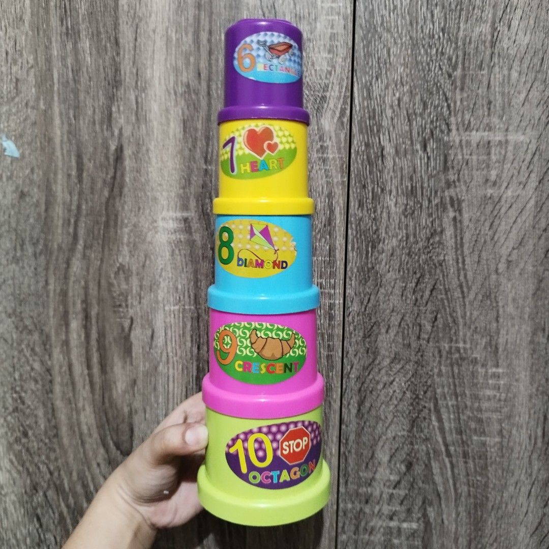 Kids Learning Set Alphabet, Numbers and Stacking Cups (Category: Infant Playtime) located in Pasig City. Submitted by kimpr (Listing ID 1376266379, Image 3). Description: Basic Learning Set (Sold as SET) Inclusive of Colorful Stacking Cups (with numbers), Number and Alphabet Figures Helps improve baby's hand and eye coordination Identification of numbers, letters and colors These items are PRE LOVED and may have minor signs of usage, so kindly ma
