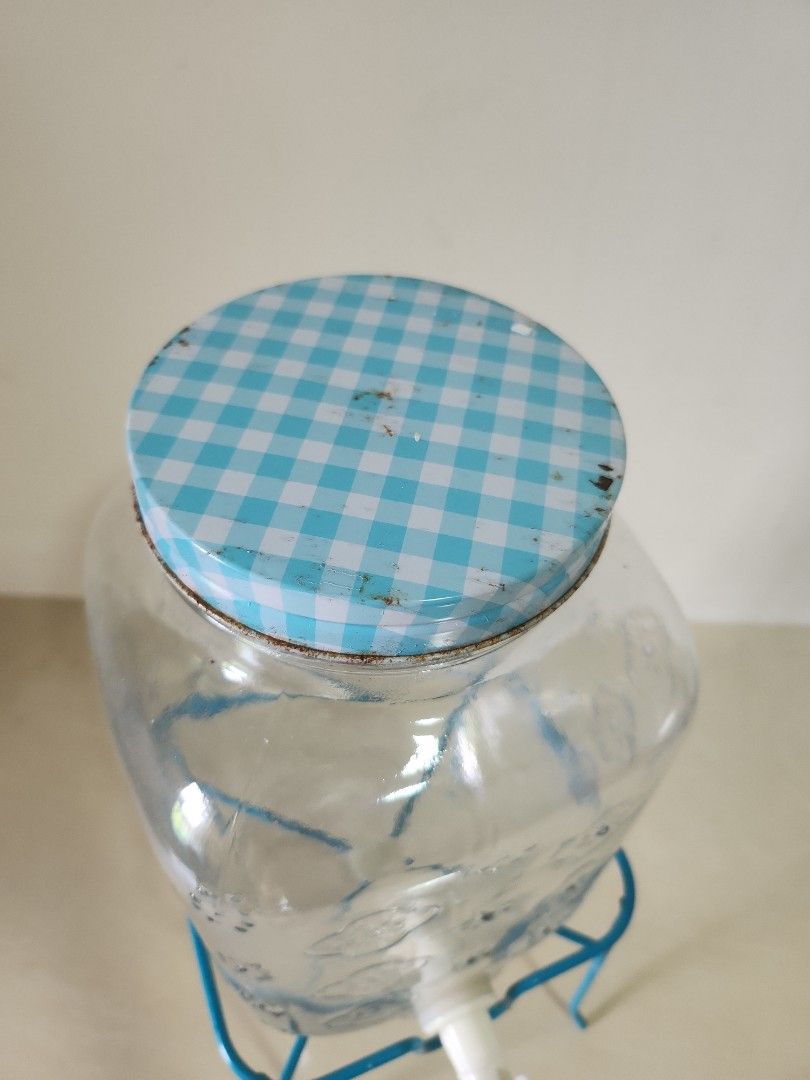 Mason jar juice dispenser (Category: Pitchers & Dispensers) located in Quezon City. Submitted by prelovedisle.ph (Listing ID 1376231577, Image 3). Description: Preloved mason jar juice dispenser with stand. See pic for condition. Wysiwyg. #masonjar #juicedispenser #masonjarjuicedispenser #waterdispenser.