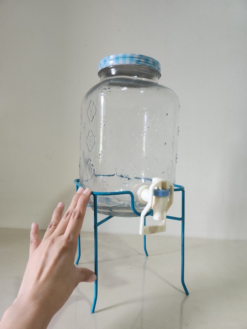 Mason jar juice dispenser (Category: Pitchers & Dispensers) located in Quezon City. Submitted by prelovedisle.ph (Listing ID 1376231577, Image 2). Description: Preloved mason jar juice dispenser with stand. See pic for condition. Wysiwyg. #masonjar #juicedispenser #masonjarjuicedispenser #waterdispenser.