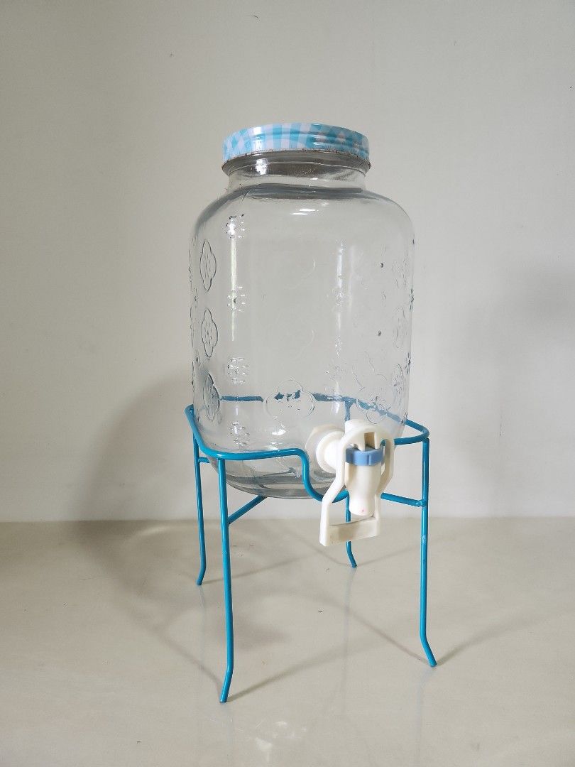 Mason jar juice dispenser (Category: Pitchers & Dispensers) located in Quezon City. Submitted by prelovedisle.ph (Listing ID 1376231577, Image 1). Description: Preloved mason jar juice dispenser with stand. See pic for condition. Wysiwyg. #masonjar #juicedispenser #masonjarjuicedispenser #waterdispenser.