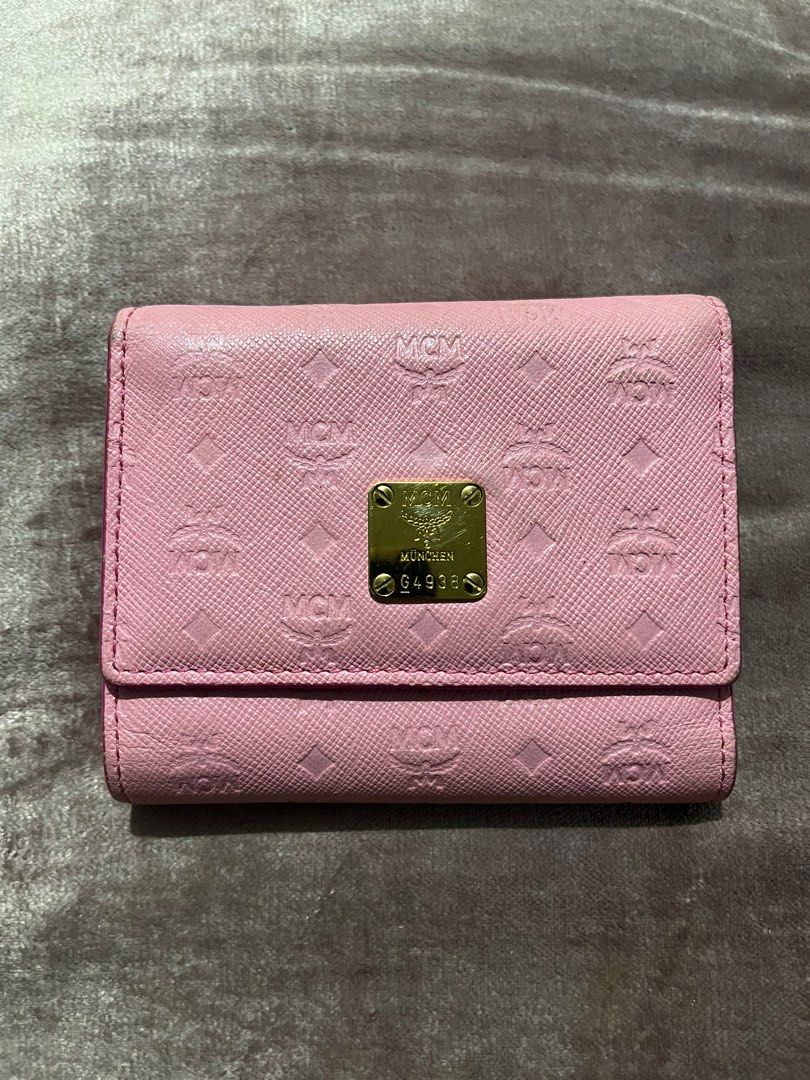 MCM PINK WALLET (Category: Luxury Bags & Wallets) located in San Fernando. Submitted by gemsfndr (Listing ID 1376343685, Image 1). Description: Pre-owned Multiple card slots ID window Bill compartment Guaranteed Authentic .
