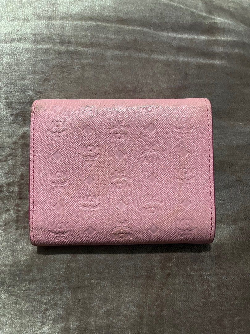 MCM PINK WALLET (Category: Luxury Bags & Wallets) located in San Fernando. Submitted by gemsfndr (Listing ID 1376343685, Image 2). Description: Pre-owned Multiple card slots ID window Bill compartment Guaranteed Authentic .