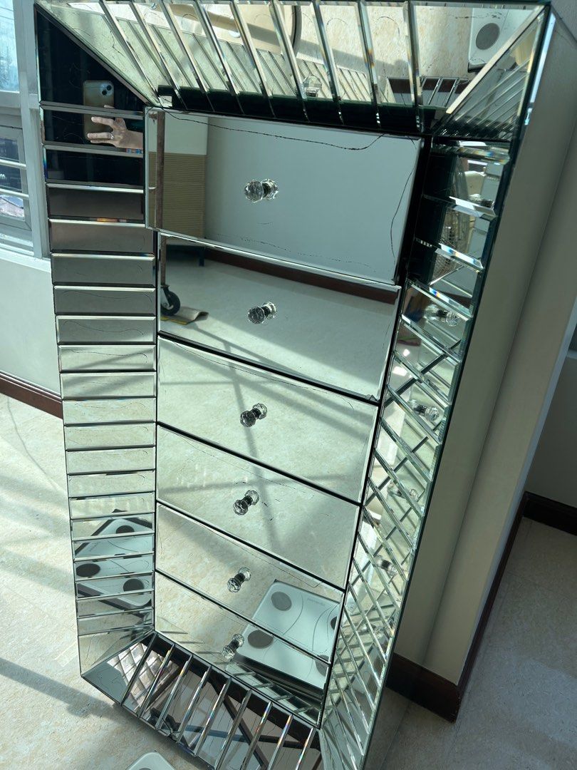 Mirrored Accent Drawer (Category: Shelves, Cabinets & Racks) located in Manila. Submitted by chiccorner (Listing ID 1376302774, Image 1). Description: With cracj at the bottom part and some mirror stains Size Width 62cm Height 128cm Depth41cm With 6 drawers.