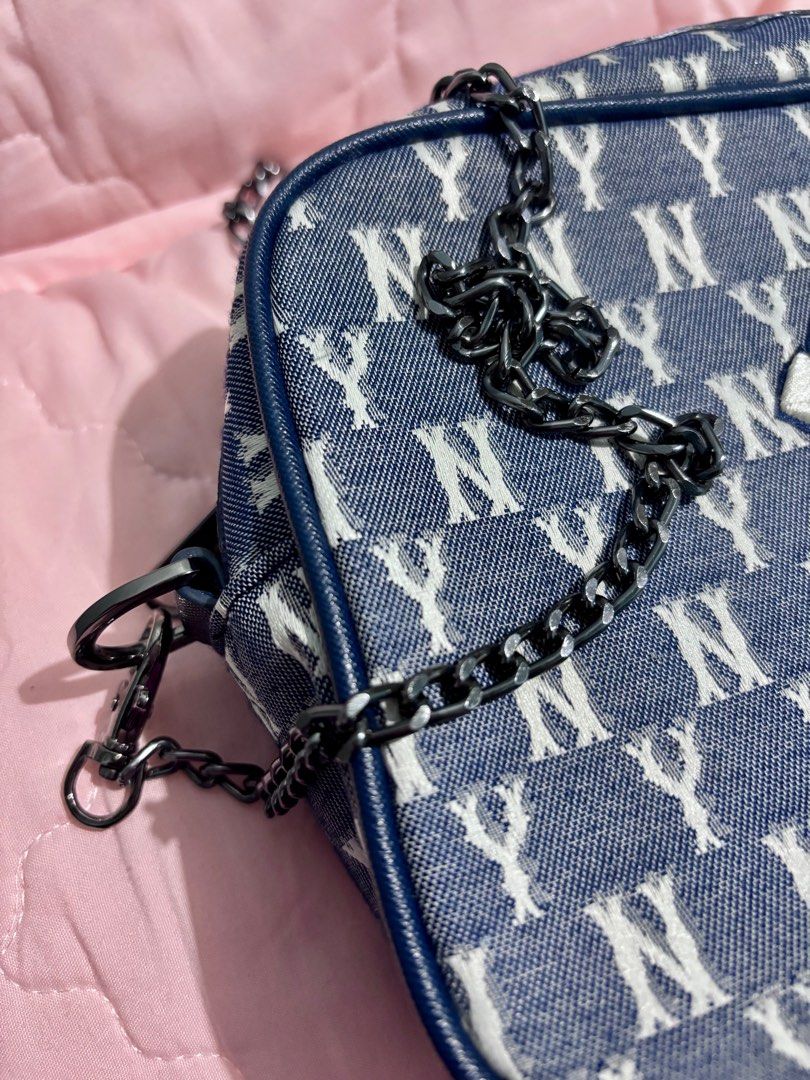 MLB New York Monogram chain crossbody bag (Category: Cross-body Bags) located in Taguig. Submitted by nisse (Listing ID 1376376958, Image 2). Description: Originally around 6k. It’s authentic and comes with tag. Check photos. Metal hardware good. No visible flaws. 9/10 condition. Comes with the wallet. .