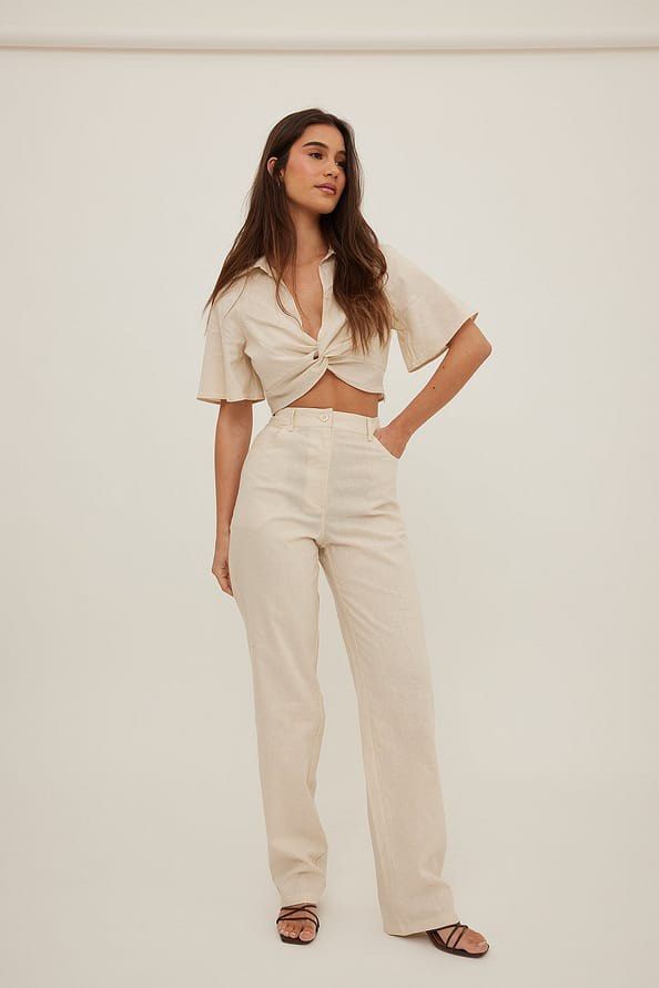 NA-KD Twisted Linen Blend Shirt (Category: Blouses) located in Quezon City. Submitted by shop.theclutter (Listing ID 1376403969, Image 1). Description: XS-S.