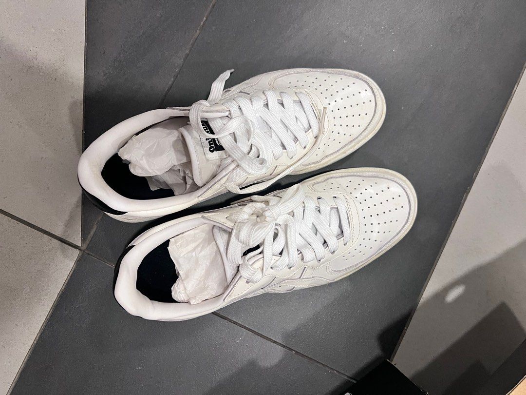 Onitsuka Tiger GSM White Sneakers Size US 6 (Category: Sneakers) located in Singapore. Submitted by youhappy (Listing ID 1376353422, Image 2). Description: Onitsuka Tiger GSM sneakers in white. US Unisex size 6, Women's size 7 1/2, Euro size 39, UK size 5. Leather upper with white laces. Comes with original box. The sole shows minimal wear..
