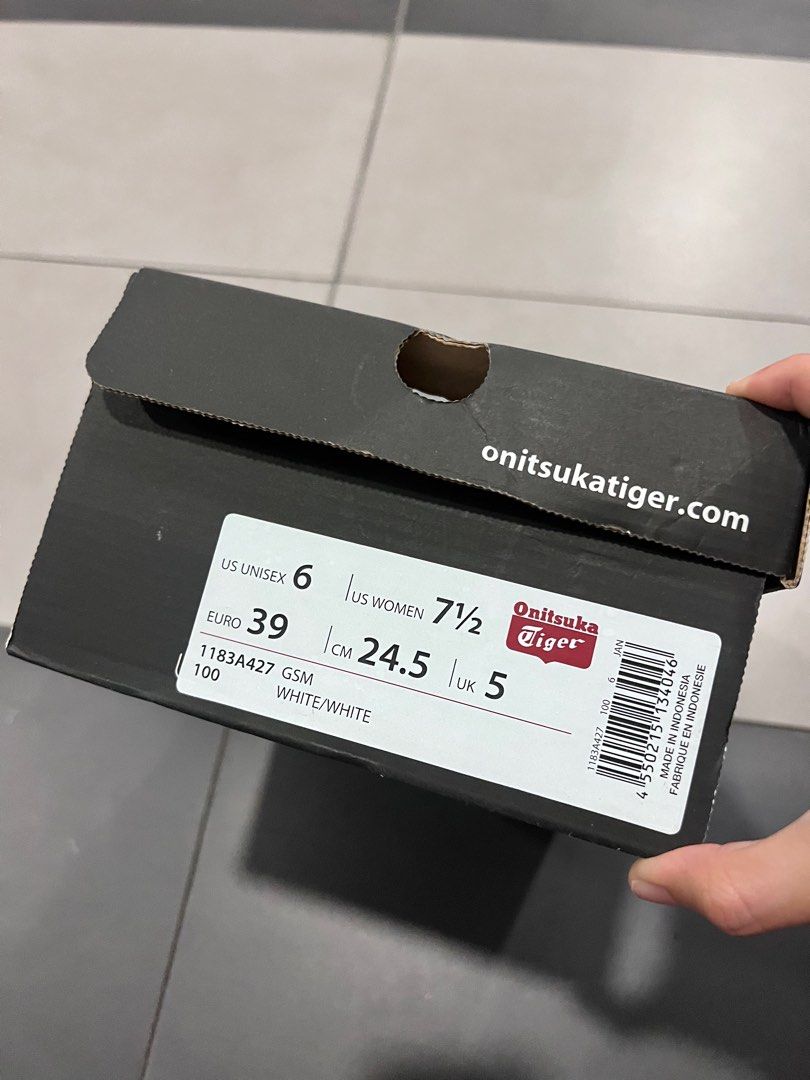 Onitsuka Tiger GSM White Sneakers Size US 6 (Category: Sneakers) located in Singapore. Submitted by youhappy (Listing ID 1376353422, Image 3). Description: Onitsuka Tiger GSM sneakers in white. US Unisex size 6, Women's size 7 1/2, Euro size 39, UK size 5. Leather upper with white laces. Comes with original box. The sole shows minimal wear..