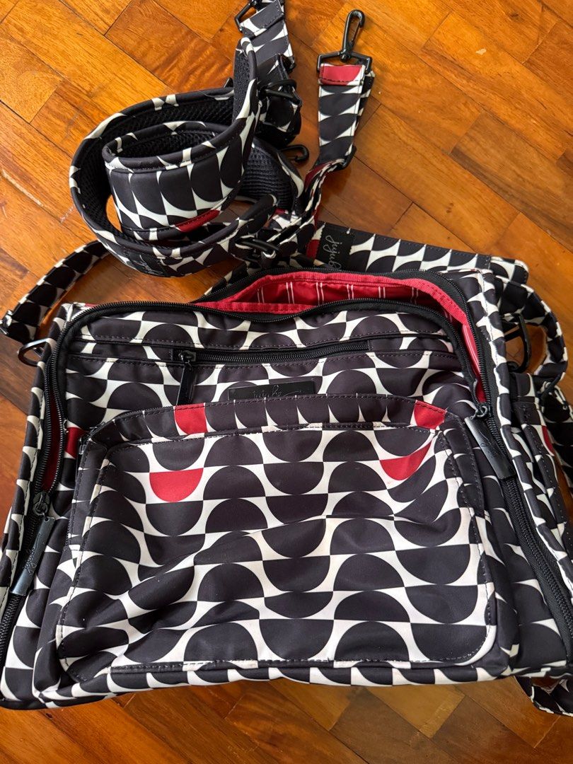 Original Jujube bag (complete with straps and changing pad) (Category: Babies & Kids Fashion) located in Pasig City. Submitted by mome_j (Listing ID 1376224165, Image 1). Description: Original Jujube bag (complete with straps and changing pad) RFS: outgrown item/decluttering.
