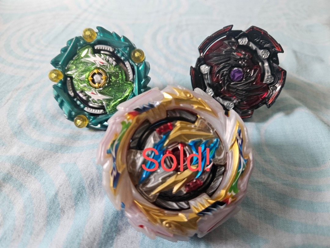 Original TAKARA TOMY Beyblade Burst Rise (Category: Action & Battle Toys) located in Trece Martires City. Submitted by zsales (Listing ID 1371439509, Image 1). Description: Preloved Original TAKARA TOMY Beyblade 200 per beyblade slightly negotiable Original price:PHP300 each What you see👀 is what you get😎 Beyblades: Tempest dragon✖️❌️✖️❌️✖️❌️sold Cursed satan(green)🟩😈 Tempestuous dragon(black)⬛️🐉 Can meet up at Puregold jr perez trece cavite
