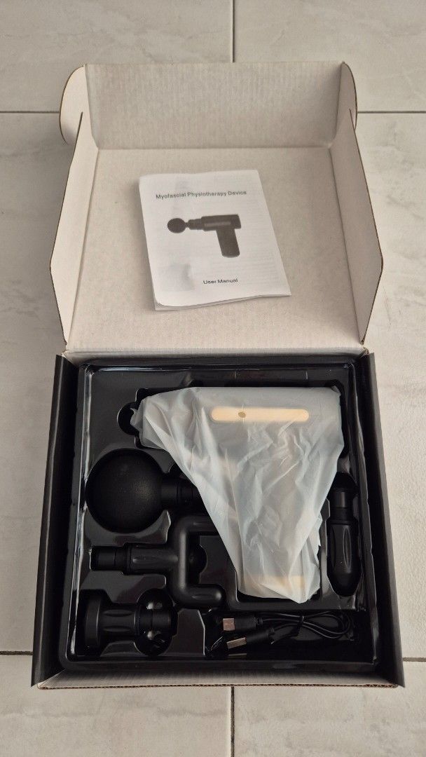 Portable Handheld Massage Gun (Category: Massage Devices) located in Singapore. Submitted by richardloo87 (Listing ID 1376304435, Image 2). Description: Brand new. Gift from company.