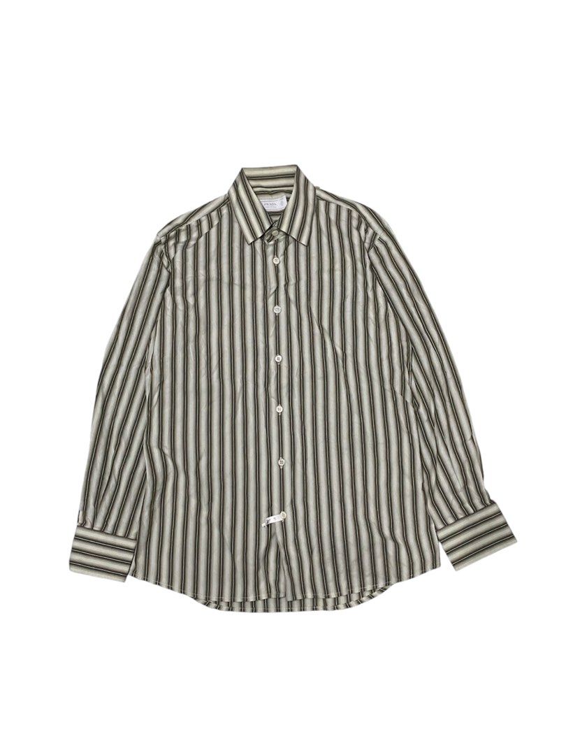 🏷️PRADA BUTTON UP STRIPED LONG SLEEVE (Category: Luxury Apparel) located in Quezon City. Submitted by angelamaec (Listing ID 1376283257, Image 1). Description: Excellent condition 20 1/2x27 sleeve length:23 Add ship.