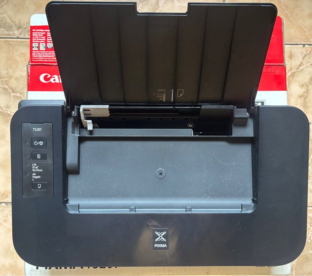 Printer | Canon Pixma TS207 (Category: Printers, Scanners & Copiers) located in Valenzuela. Submitted by astrid0327 (Listing ID 1376256596, Image 2). Description: Canon Pixma TS207 Used few times and in good condition * Wired printer * Print only (no scan or photocopy) * No other issue * No history of repair * With box and manual Note: need cartridge ink replacement RFS: declutter .