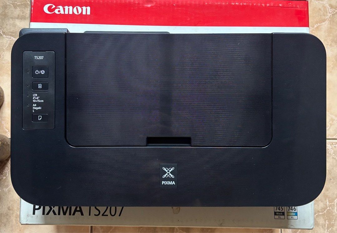 Printer | Canon Pixma TS207 (Category: Printers, Scanners & Copiers) located in Valenzuela. Submitted by astrid0327 (Listing ID 1376256596, Image 1). Description: Canon Pixma TS207 Used few times and in good condition * Wired printer * Print only (no scan or photocopy) * No other issue * No history of repair * With box and manual Note: need cartridge ink replacement RFS: declutter .