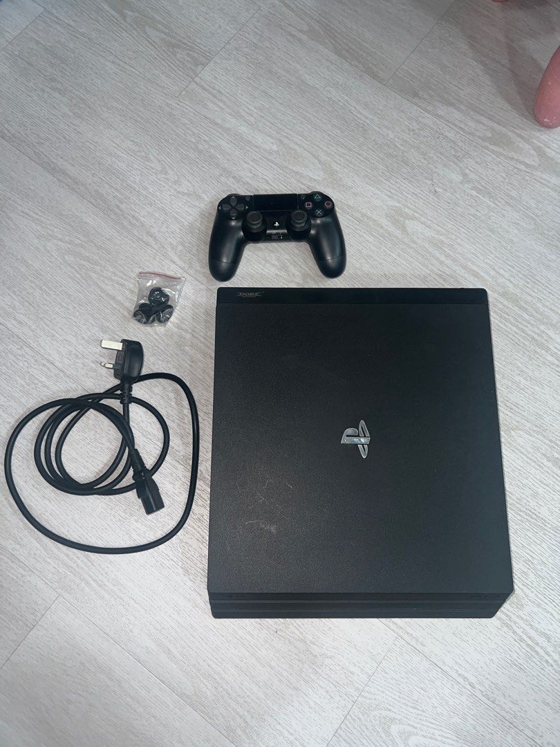 PS4 Pro 1TB with games62853059234179111