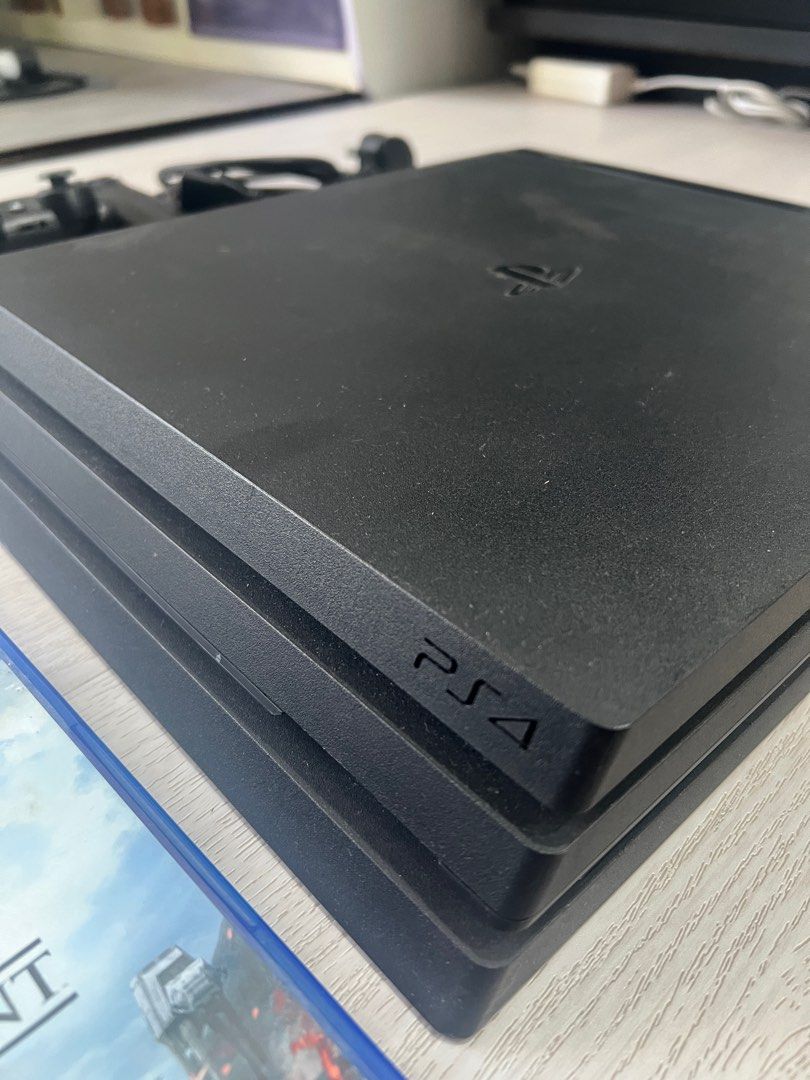 PS4 Pro 1TB with games62853059234179112