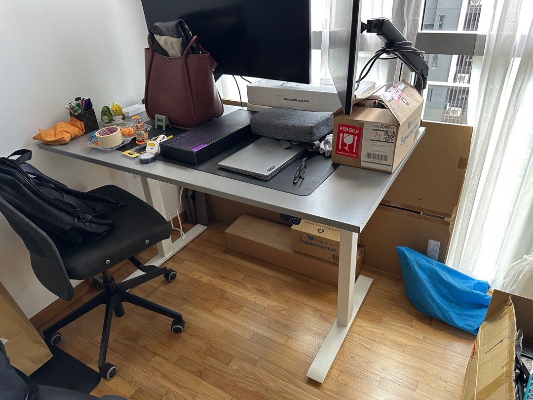 IKEA Computer Height Adjustable Table (Category: Tables & Sets) located in Singapore. Submitted by akarsh.agarwal (Listing ID 1376243638, Image 1). Description: Like new IKEA Rudolf 140*80 cm height adjustable study/computer table with no scratches. Have same 2 tables. Selling the already dismantled and packed one. Can view the table top if want to. Ready to ship. Perfect table. Less than 6 months old. 10 years warranty from Ikea. Reason for sell