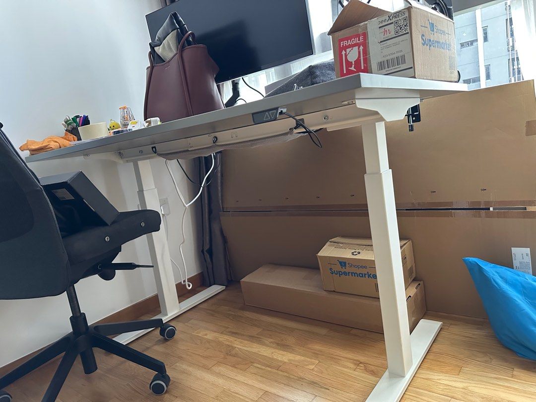 IKEA Computer Height Adjustable Table (Category: Tables & Sets) located in Singapore. Submitted by akarsh.agarwal (Listing ID 1376243638, Image 2). Description: Like new IKEA Rudolf 140*80 cm height adjustable study/computer table with no scratches. Have same 2 tables. Selling the already dismantled and packed one. Can view the table top if want to. Ready to ship. Perfect table. Less than 6 months old. 10 years warranty from Ikea. Reason for sell