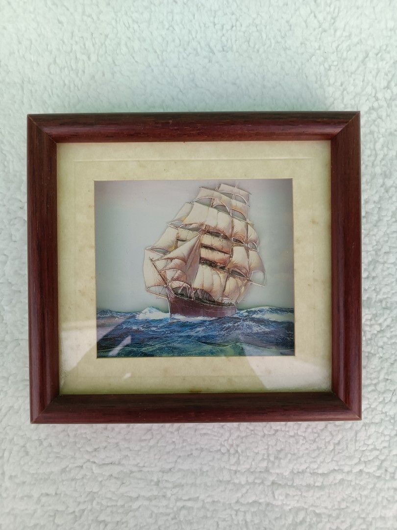 Ship Design in a Shadow Box Frame (Category: Frames & Pictures) located in Batangas. Submitted by buddy_and_willow (Listing ID 1376393777, Image 1). Description: Ship design inside the frame is fixed already. PRELOVED FROM UNITED KINGDOM PAYMENT FIRST VIA GCASH SHIPPING VIA J&T or LBC. SF CARE OF BUYER. FOR FRAGILE ITEMS LIKE FRAMES OR THOSE WITH GLASS, I HIGHLY RECOMMEND LBC FOR THE SHIPPING.