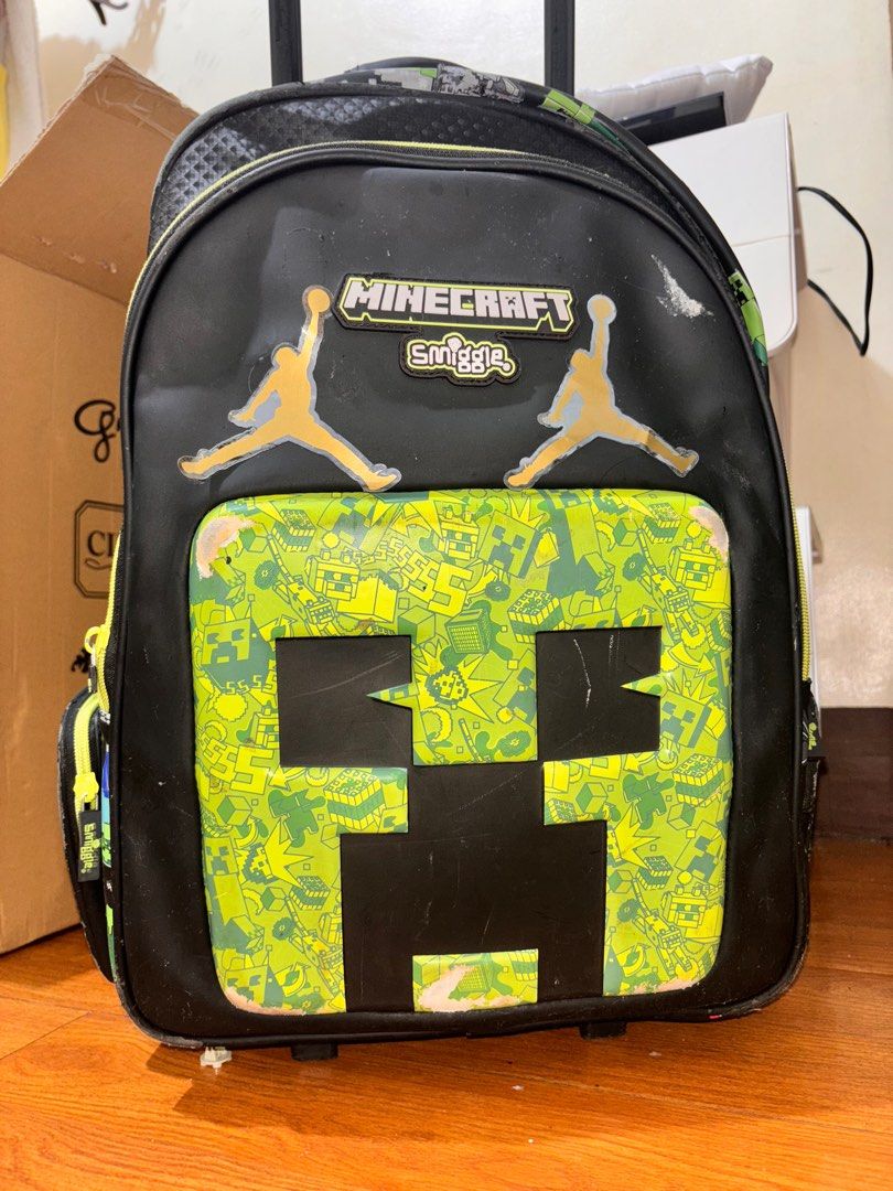 Smiggle Minecraft Trolley Bag (Category: Backpacks) located in Quezon City. Submitted by Third (Listing ID 1376333625, Image 1). Description: Smiggle Minecraft Trolley Bag -With visible signs of use but still in perfect working condition -Bought for 1800, selling for 500 -RFS: upgraded into a bigger bag -Location: Bagong Silangan, QC *last price posted 📍Checknoc main, Quezon City .