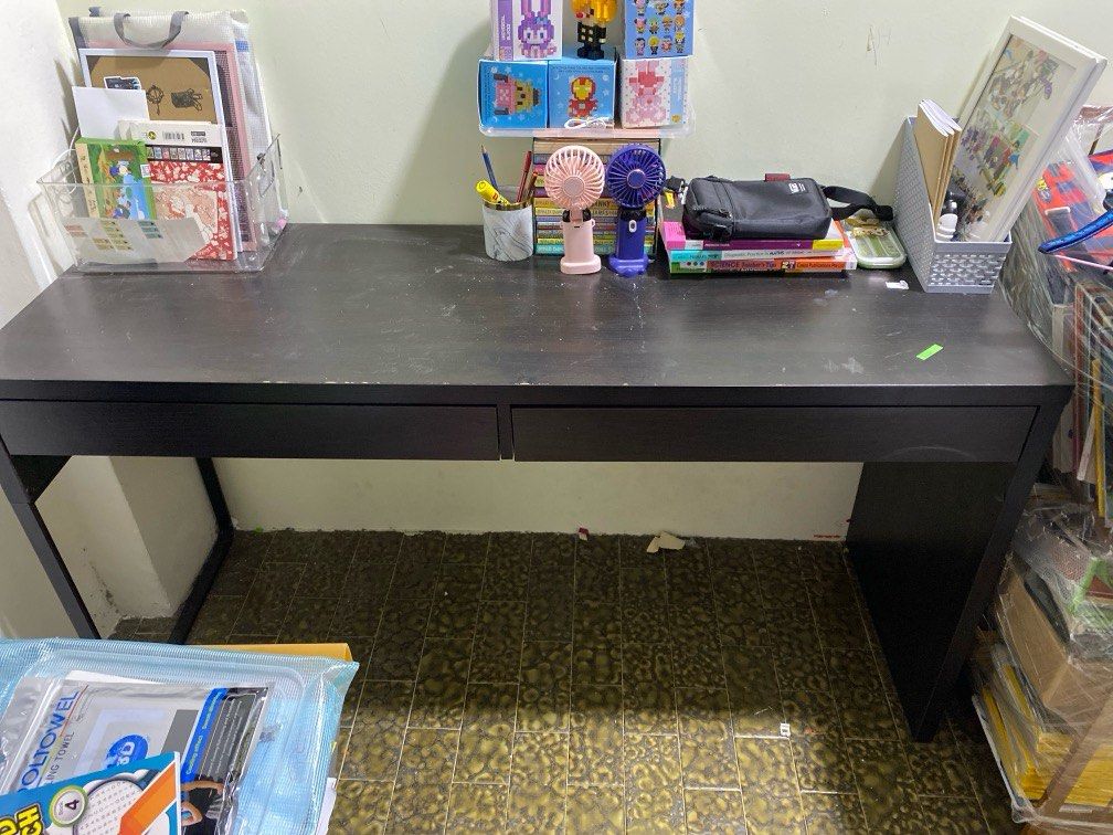 Study table (Category: Tables & Sets) located in Singapore. Submitted by lush_and_co (Listing ID 1376232918, Image 1). Description: Length 142cm Width 50cm Self collect Dark brown Good condition Not for fussy Two drawers .