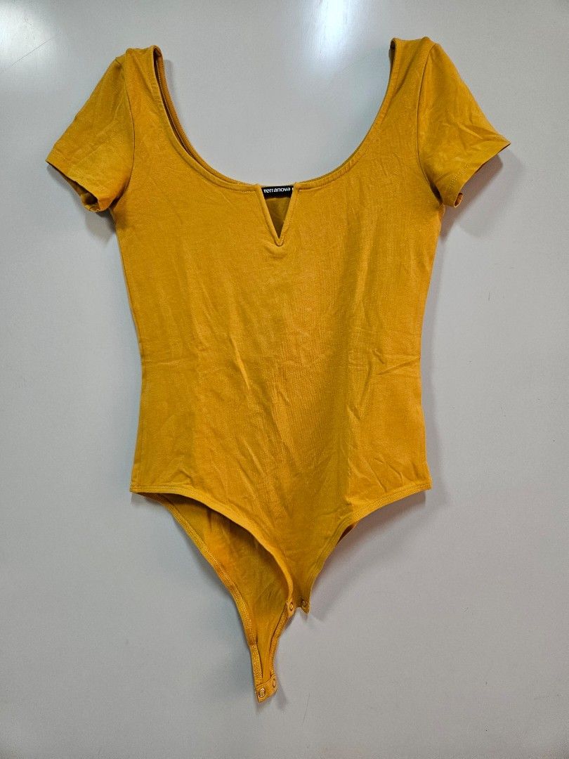 TERRANOVA body suit mustard vneck (Category: Others Tops) located in Pasig City. Submitted by authph (Listing ID 1376301653, Image 1). Description: sf c/o buyer delivery : j&t / lalamove / grab mop : gcash / bpi / unionbank / maya strictly no cod.
