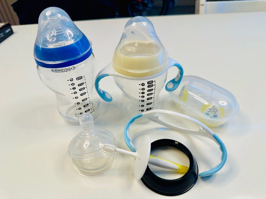 Tommee Tippee Bottles glass and plastic, pacifiers (Category: Breastfeeding & Bottle Feeding) located in Singapore. Submitted by ithakan (Listing ID 1376419078, Image 1). Description: Tommee tippee milk bottles (glass and plastic), handles, newborn pacifiers, fast flow Y teats etc. $15 for all. All unused except for the glass bottle which was used a few times..