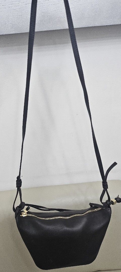 LOEWE (Category: Luxury Bags & Wallets) located in Pasig City. Submitted by vkcz702 (Listing ID 1376359977, Image 3). Description: mini hammock hobo bag in brown color..