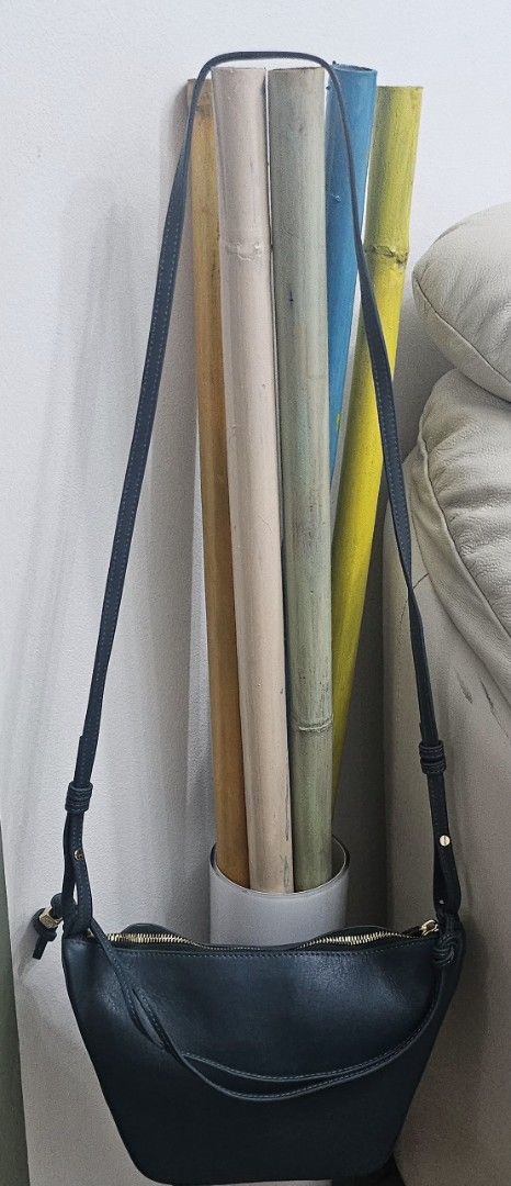 LOEWE (Category: Luxury Bags & Wallets) located in Pasig City. Submitted by vkcz702 (Listing ID 1376401789, Image 3). Description: mini hammock hobo bag in green color. with dust bag and box..