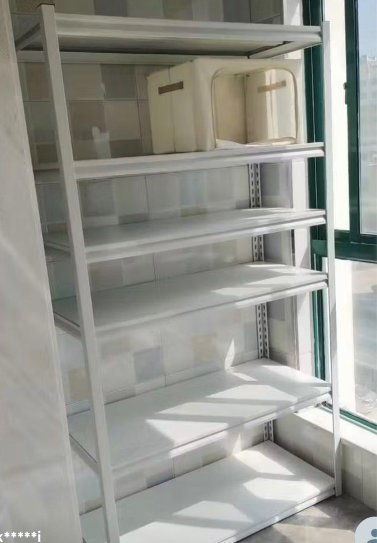 White Boltless Rack (Category: Shelves, Cabinets & Racks) located in Singapore. Submitted by Jiko_Ai (Listing ID 1376358421, Image 3). Description: $60 1 x White Boltless Rack (4-tiers) All in good condition, used for 3yrs (online merchandize storage) Adjustable shelf height No screws required, easy installation Double layer iron Height: 1.8m Length: 0.8m Depth: 0.5m Dismantled, buyer to arrange own transpo.
