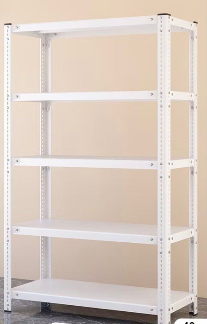 White Boltless Rack (Category: Shelves, Cabinets & Racks) located in Singapore. Submitted by Jiko_Ai (Listing ID 1376358421, Image 2). Description: $60 1 x White Boltless Rack (4-tiers) All in good condition, used for 3yrs (online merchandize storage) Adjustable shelf height No screws required, easy installation Double layer iron Height: 1.8m Length: 0.8m Depth: 0.5m Dismantled, buyer to arrange own transpo.