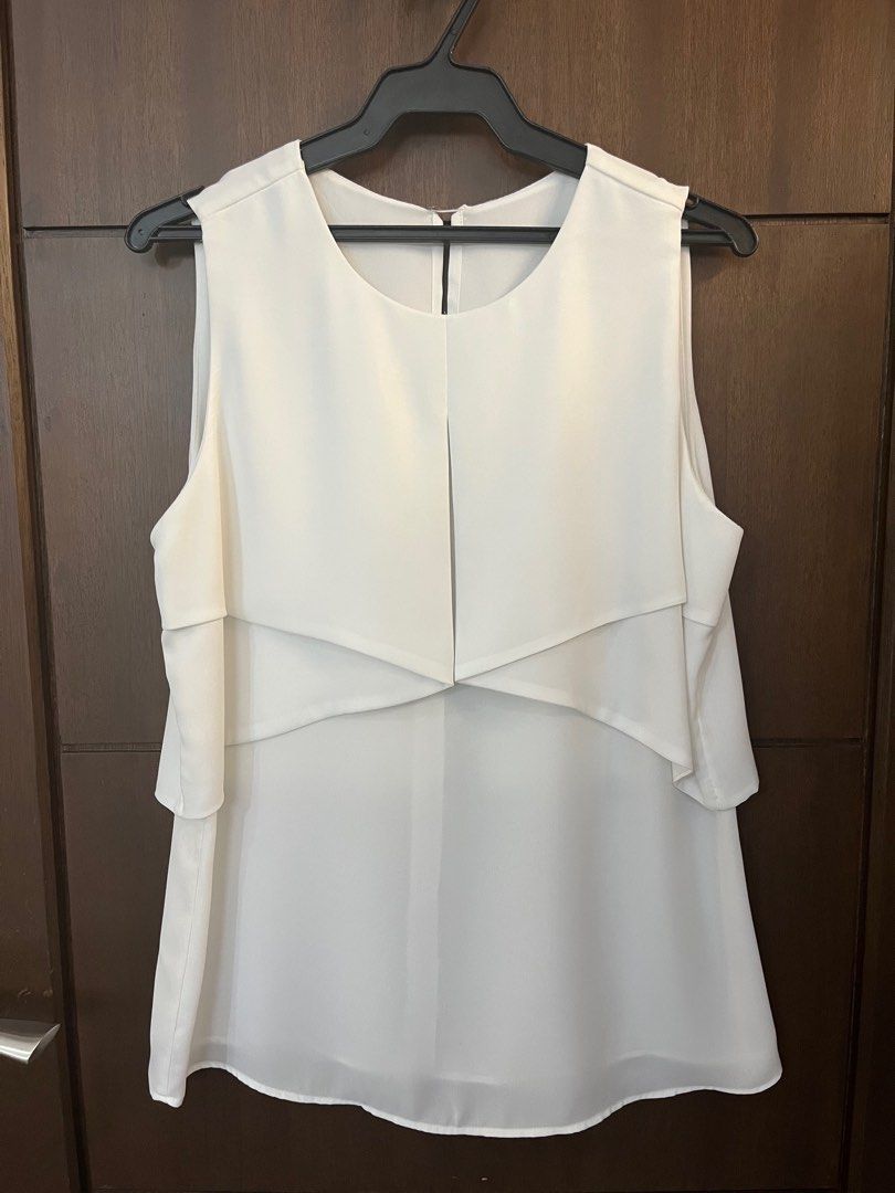 Zara sleeveless top (Category: Sleeveless) located in Mandaluyong City. Submitted by nv0331 (Listing ID 1376268814, Image 1). Description: Measurements laid flat: Ppt/bust - 19” Length - 24”.