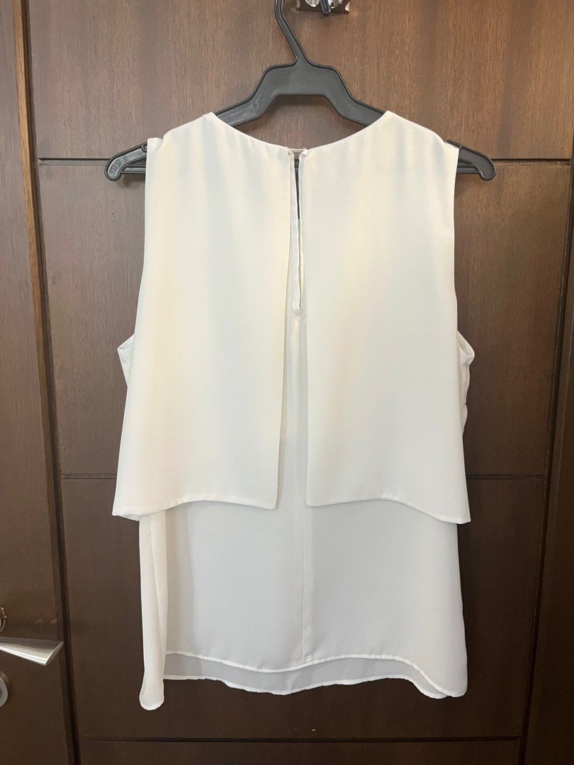 Zara sleeveless top (Category: Sleeveless) located in Mandaluyong City. Submitted by nv0331 (Listing ID 1376268814, Image 2). Description: Measurements laid flat: Ppt/bust - 19” Length - 24”.