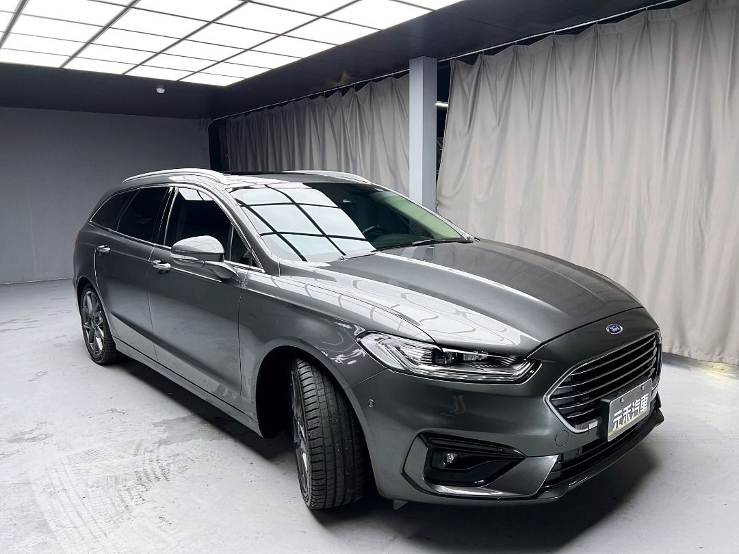 由 abc900616 (刊登 ID 1376555742，圖片 2) 提交，位於 新北市 (New Taipei) 的 2020 Ford Mondeo Wagon EcoBoost 240跑旅車型 2.0 汽油 (類別：汽車出售)，說明：🚗2020 Ford Mondeo Wagon EcoBoost 240跑旅車型 2.0 汽油 ⚠️來買車找阿吉 專業出擊⚠️ ✅里程保證：100000公里 ✨找阿吉甜甜價：60.8萬（新車售價133萬） ☎️24H服務：0980-528-993 記得找阿吉！（同Line） ❗️截圖來店找阿吉，讓阿吉有個服務的機會❗️ 「找阿吉全館全車系不限年份里程贈188天保固+開立足額發票」 ✨珍珠灰 渦輪增壓/直列四缸/240匹馬力、進口旅行車款、動力操控安全到位、ACC主動跟車/雙前電熱座椅/全景天窗/盲點偵測/CarPlay、升級19吋輕量化鋁圈/變形蟲方向盤 🔥重點配備：前後霧燈、後視鏡方向燈、LED日行燈/頭燈/尾燈、主動轉向頭燈、車頂行李架、全景