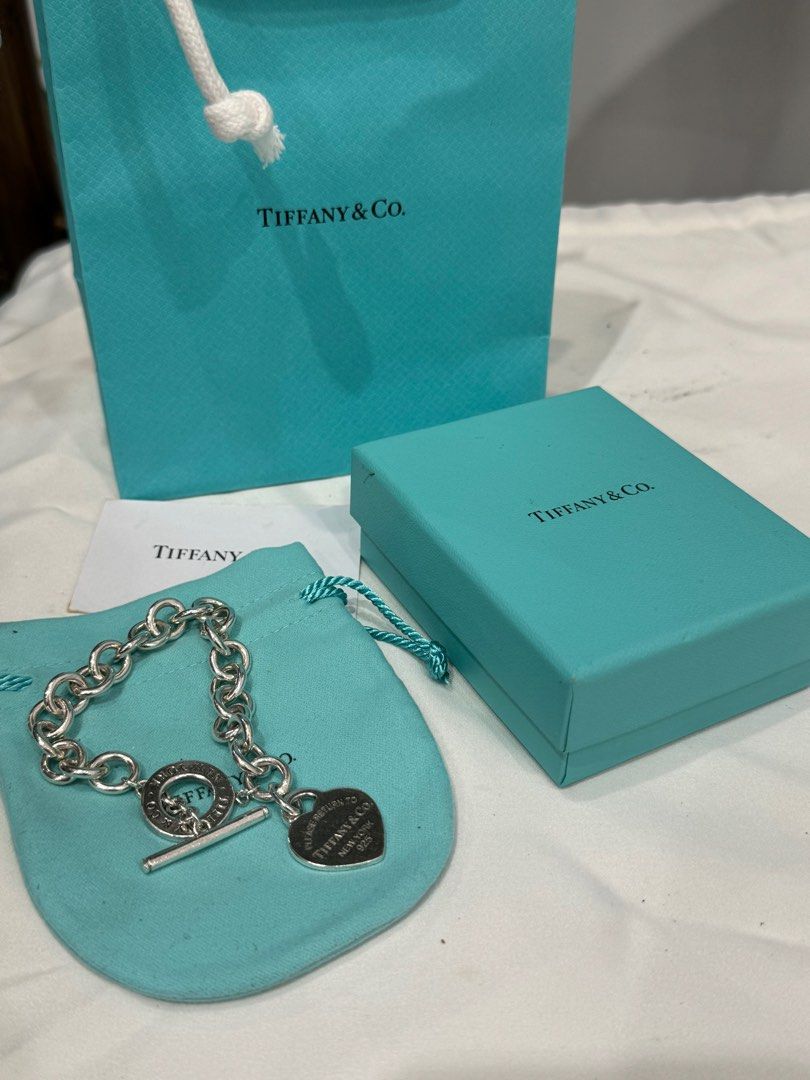 Authentic Toffany & Co/marked down (Category: Luxury Accessories) located in Manila. Submitted by chloe_luxuries (Listing ID 1376474355, Image 1). Description: Guaranteed original Tiffany & Co Heart Tag Toggle Bracelet in Silver 8-inches wrist size Complete inclusion Pm for more details.