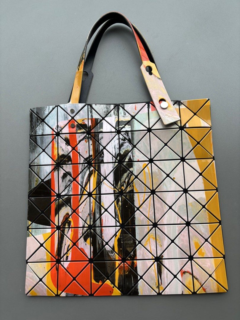 Bao Bao Issey Miyake Multicolor Gravity Paint 6x6 Tote (Category: Bags & Wallets) located in Singapore. Submitted by bagacholic (Listing ID 1376511683, Image 2). Description: Limited edition. Good condition, visible wear on inside of straps. No mark or scratch on exterior of bag..