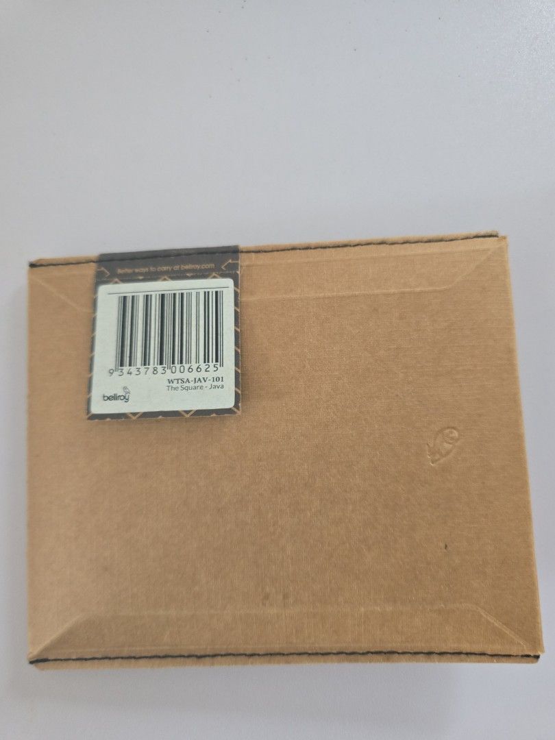 Bellroy The Square Java Wallet (Category: Wallets & Card Holders) located in Singapore. Submitted by dawnpcl (Listing ID 1376435324, Image 2). Description: still good condition except for a bit worn-off. bought at rtp 100+ come complete set with card & sleeve box..