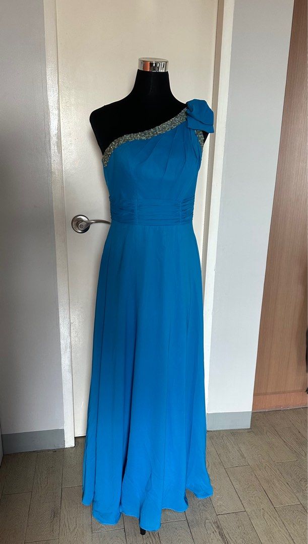 Blue Formal Gown (Category: Evening dresses & gowns) located in Quezon City. Submitted by ginggaloo (Listing ID 1376525103, Image 2). Description: Cerrulean blue formal gown. Wearer height 5’2” Was used as custom gown for bridesmaid Bust - 36in Waist - 29-30in Gown Length - 56in.