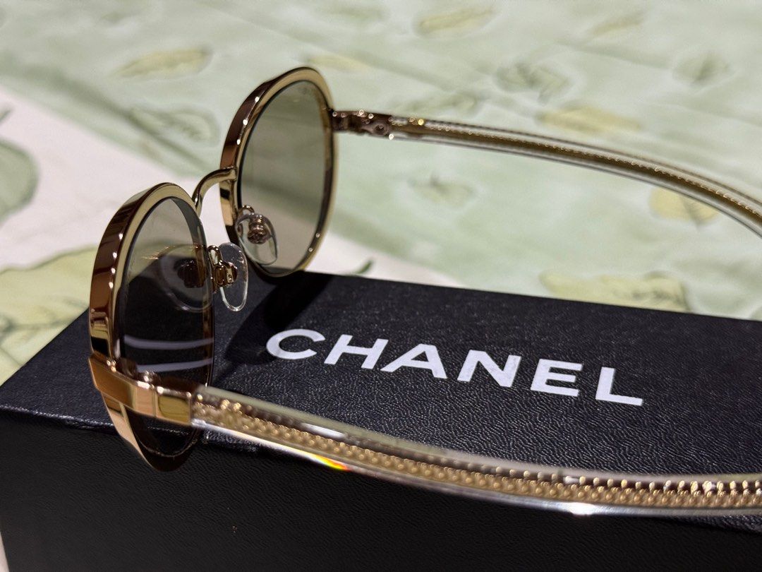 chanel sunglasses round (Category: Sunglasses & Eyewear) located in Pasay City. Submitted by alphaq21 (Listing ID 1376544493, Image 3). Description: used no scratches with box case (not so good in condition) and pouch.