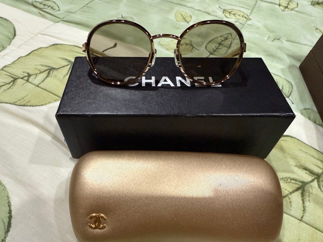 chanel sunglasses round (Category: Sunglasses & Eyewear) located in Pasay City. Submitted by alphaq21 (Listing ID 1376544493, Image 1). Description: used no scratches with box case (not so good in condition) and pouch.