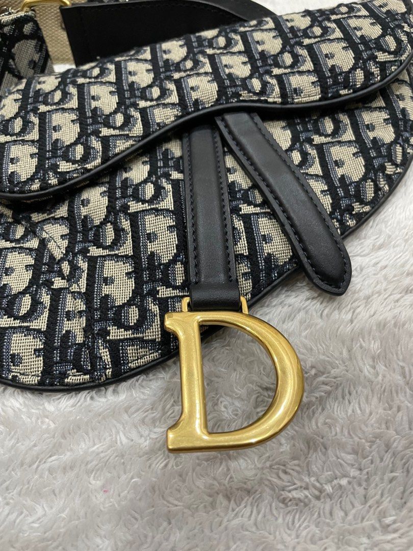 Christian Dior Saddle Belt Pouch (Category: Luxury Bags & Wallets) located in Agoo. Submitted by omaethrift (Listing ID 1376530227, Image 3). Description: 3D monogram pa double check niyo nalang po para safe po🙇🏻‍♂️🙇🏻‍♂️🙇🏻‍♂️ May missing po sa belt niya diko po alam tawag dun over all malinis maganda pa Free na po yung sling provide lang po yung sling.