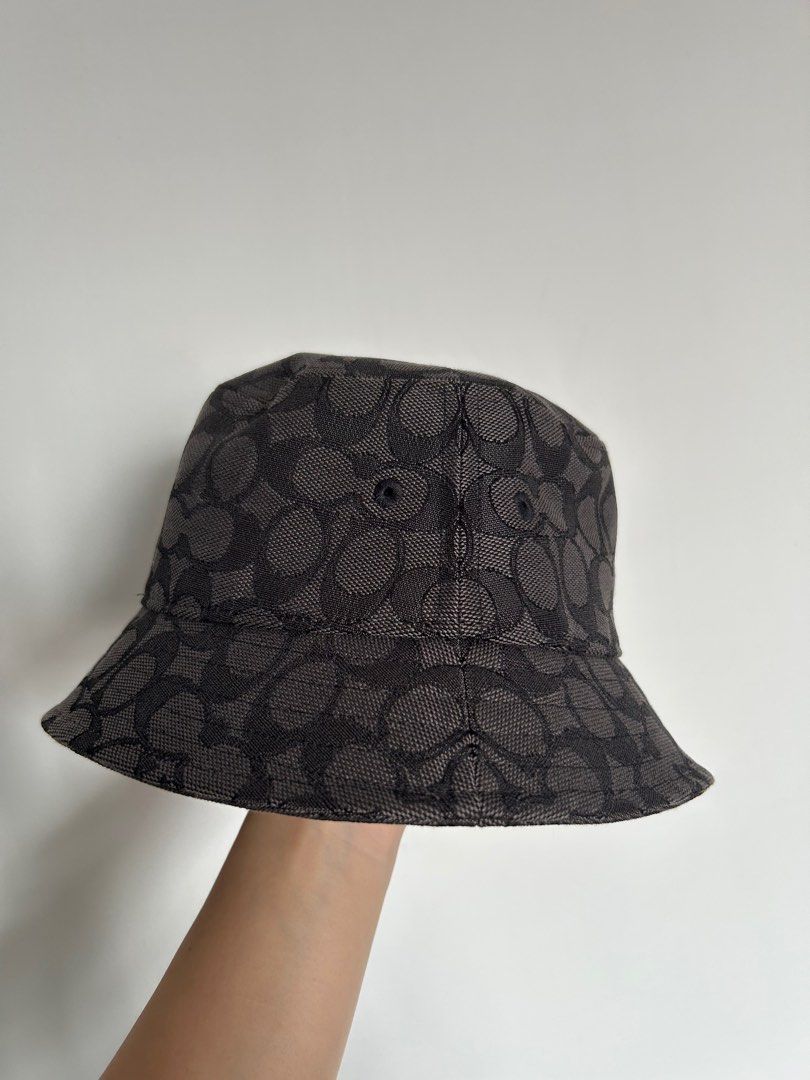 Authentic Coach jacquard bucket hat (charcoal/black) (Category: Caps & Hats) located in Singapore. Submitted by zxc_zz (Listing ID 1376481227, Image 2). Description: Brand new, bought on impulse Misplaced the dust bag, but i can provide with another brand's dust bag Rtp: $250.