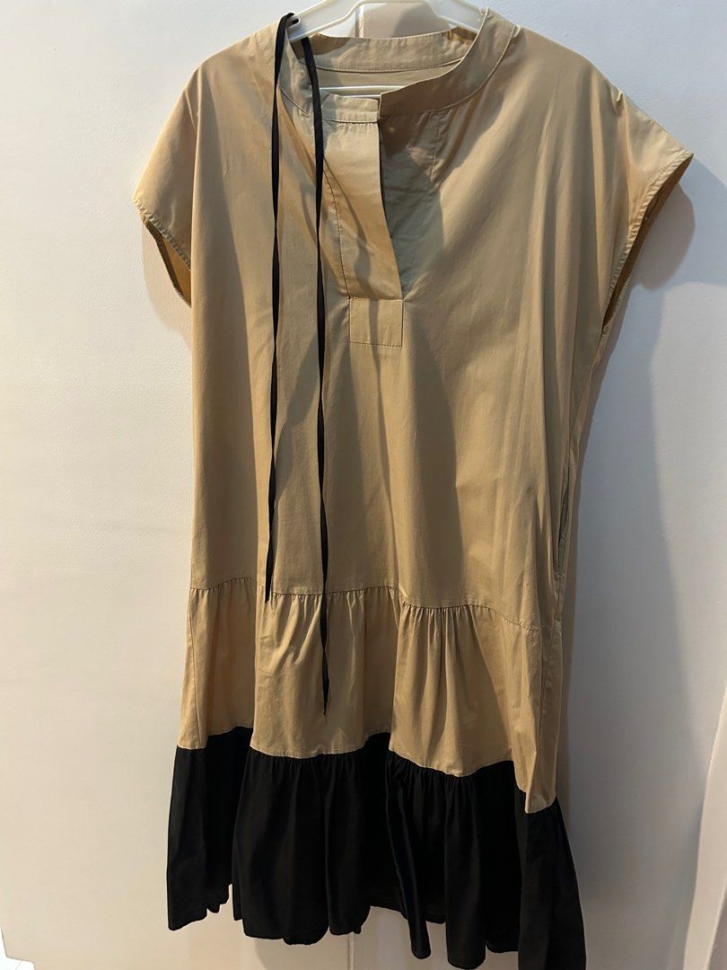 Cotton Beige with black Dress (Category: Dresses) located in Quezon City. Submitted by katcris (Listing ID 1376495073, Image 1). Description: With slim belt tie Reason for selling : small for me Length : 44 in Width : 20 in.