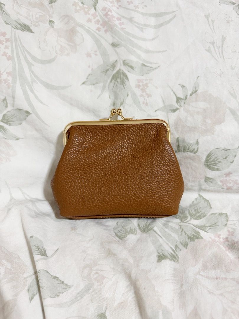 Dooney & Bourke Pebble Grain Large Framed Purse - Caramel (Category: Wallets & Card holders) located in Cebu City. Submitted by mekyoo (Listing ID 1376431375, Image 2). Description: * Rich European pebble grain leather * Frame closure * H 4.5" x W 1.25" x L 5.75" * 1 oz. * Credit card slots --- RFS: just decluttering.