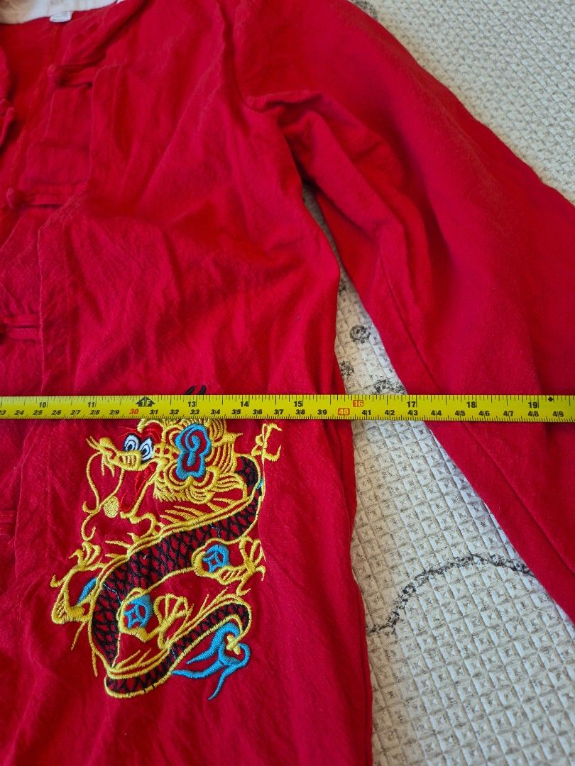 Embroidered Dragon Red Chinese Top (Category: Babies & Kids Fashion) located in Singapore. Submitted by deepredmui (Listing ID 1376437745, Image 3). Description: Stunning red Chinese-style top with gold and teal dragon embroidery. Mandarin collar, long sleeves. Measurements: Chest 56cm, Length 68cm, Sleeve 58cm. A unique and stylish piece. In very good condition size 140cm, should fit kids below 150cm pick up from Havelock Road or top up sgd3 for