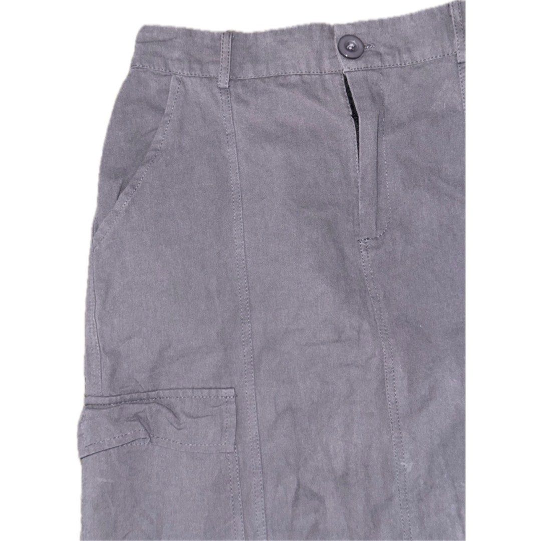 Grey Knee-Length Cargo Skirt (Category: Skirts) located in Mabalacat. Submitted by jiwitubi (Listing ID 1376563336, Image 2). Description: • back slit • button and zipper is in good condition • has pockets • dm for more pics • mod: j&t • mop: gcash (payment first before shipment) • customer will shoulder delivery fee.