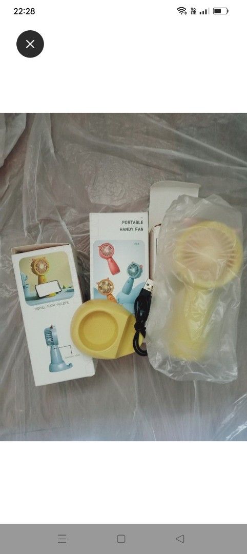 Handheld Fan (Category: Other Babies Going Out Needs) located in Singapore. Submitted by bookstand (Listing ID 1376581931, Image 1). Description: Portable handheld fan. In excellent condition. Yellow. Tag: fan, portable fan, baby going out needs .