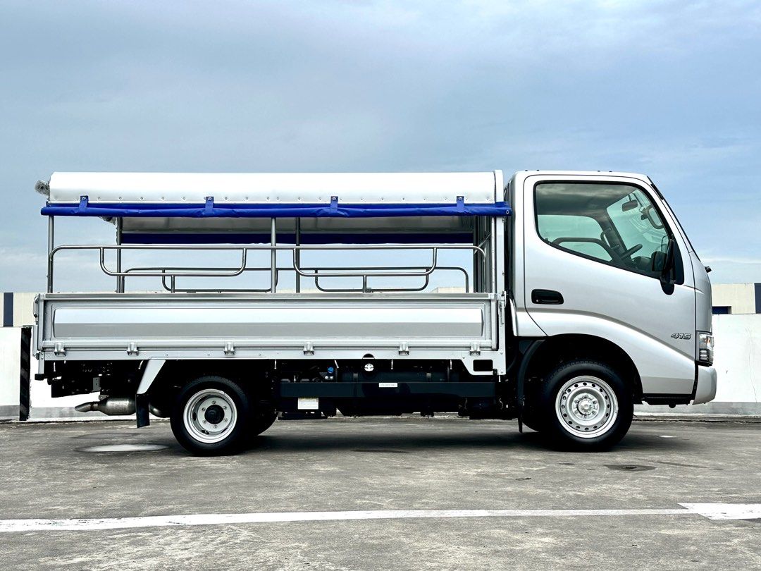 Hino Dutro 2.8M (Category: New Commercial Vehicles for Sale) located in Singapore. Submitted by sgmpteltd (Listing ID 1376519581, Image 2). Description: ☎️8808 3898 - J.T [New] Hino Dutro 2.8M New Hino Dutro 200 under Borneo warranty and servicing! Able to equip with full canopy/box/open and checkered plate! Highest demanded 10ft lorry in the market! The ultimate workhorse that comes with a great fuel efficiency! No gimmicks! View to Believe! Cal