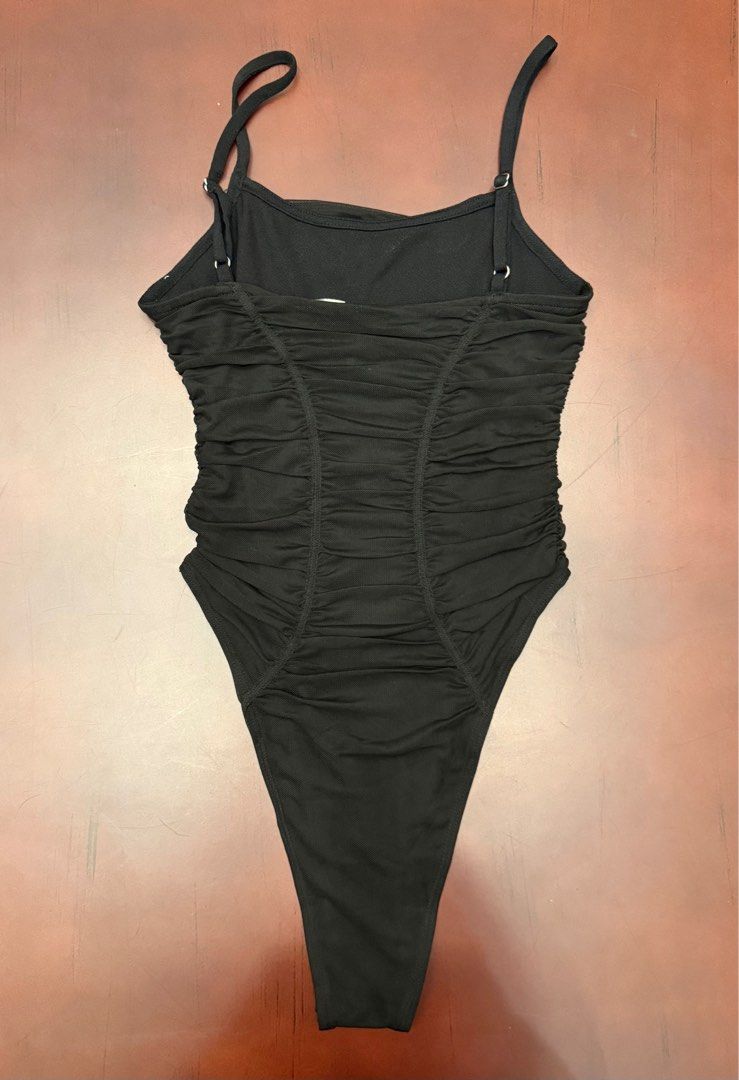 H&M divided black bodysuit sleeveless top (Category: Sleeveless) located in Tarlac. Submitted by elroy3 (Listing ID 1376585422, Image 2). Description: .